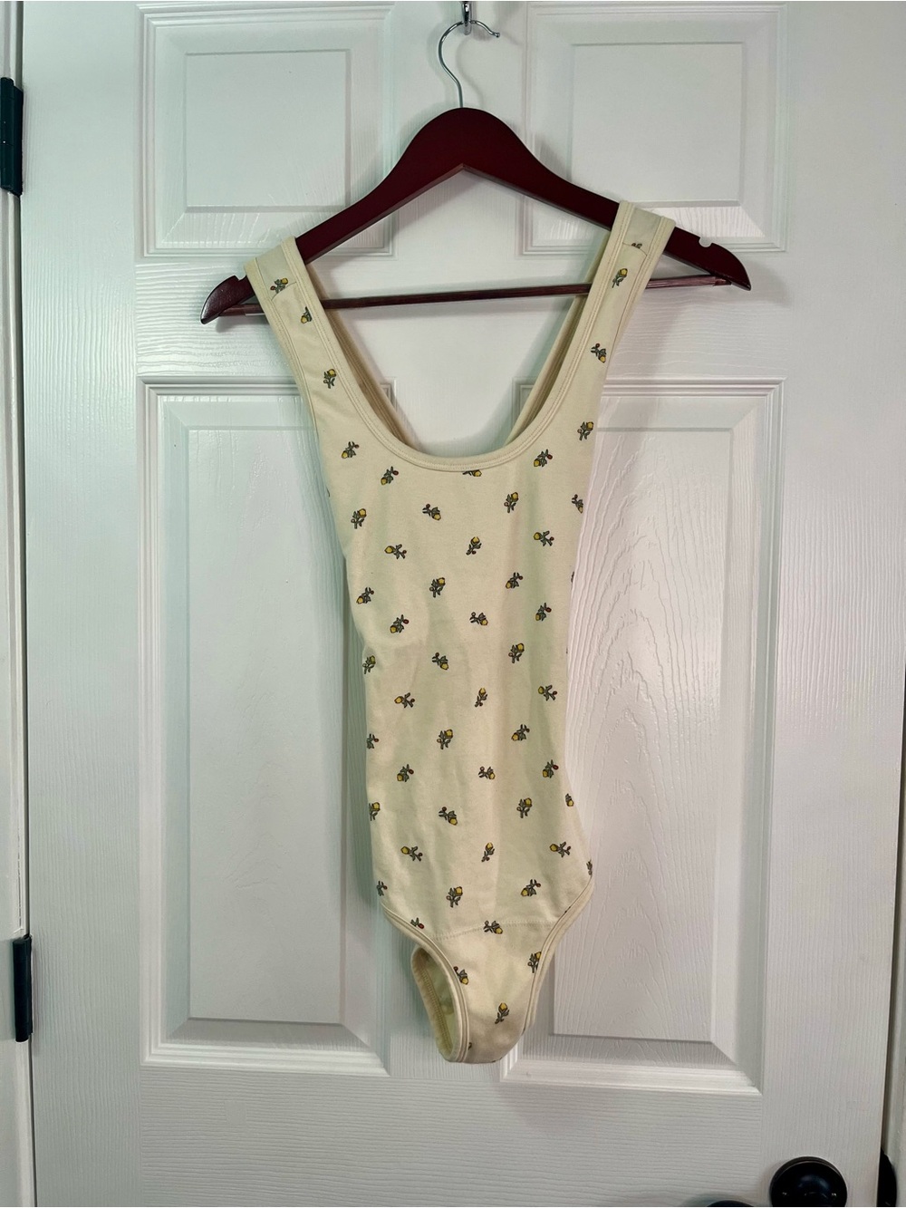 ARQ yellow calico Cleo bodysuit